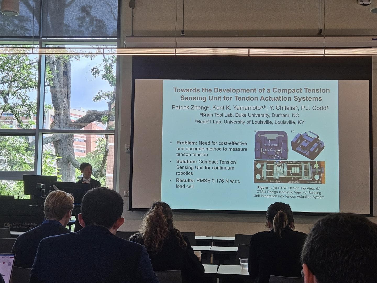Patrick Zheng presenting CTSU at conference with slides